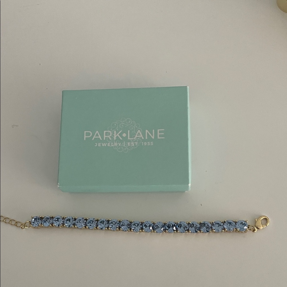 Park Lane Gold Impression bracelet with blue stones